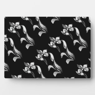 Abstrakte Schwarz-weiß glänzende Blume auf schwarz Fotoplatte