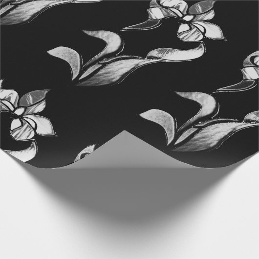 Abstrakte Schwarz-weiß glänzende Blume auf schwarz Geschenkpapier (Ecke)