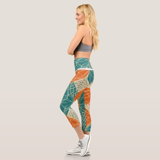 Abstrakte Teal-, Orange- und Beige-Blumen Capri Leggings (Links)