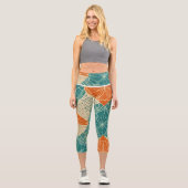 Abstrakte Teal-, Orange- und Beige-Blumen Capri Leggings (Vorderseite)