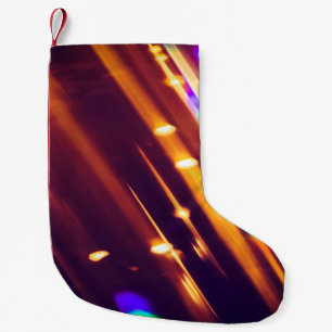Abstrakte xmas Gold Glitzern oder Glitzer Lichter. Kleiner Weihnachtsstrumpf