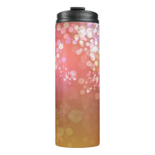 Abstrakter glamouröser, glänzender Hintergrund. Thermosbecher