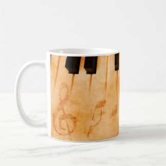 Abstrakter musikalischer Hintergrund - Tastatur un Kaffeetasse