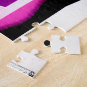 Abstrakter Regenbogen hinter den Silhouetten des S Puzzle (Seite)