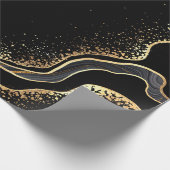 abstrakter schwarzer Agerhintergrund mit goldenen  Geschenkpapier (Ecke)