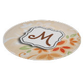 Abstrakter Strudel-Blumenorange mit Monogramm Schneidebrett (Ecke)