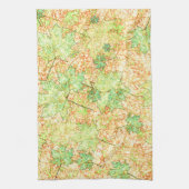 Abstraktes Acerblatt auf zerkratztem Boden, beige Geschirrtuch (Vertikal)