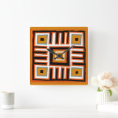 Abstraktes afrikanisches geometrisches Stammmuster Quadratische Wanduhr (Zuhause)