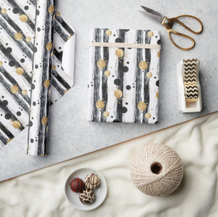 Abstraktes Aquarellmuster mit Goldakzenten Geschenkpapier