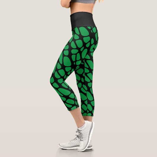 Abstraktes Bio Skin-Muster grün und schwarz Capri Leggings (Links)