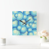 Abstraktes Blau im Grün Quadratische Wanduhr (Zuhause)