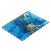 Abstraktes Blau- und Goldfragment mit farbigem Rüc Notizblock (Linke Seite)