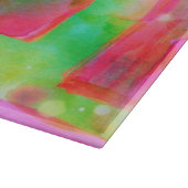 Abstraktes gemaltes Gelb des Sonnenlichts, rosa Schneidebrett (Ecke)