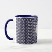Abstraktes geometrisches Mustermonogramm der Tasse (Links)