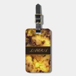 Abstraktes goldenes Bokeh Gepäckanhänger