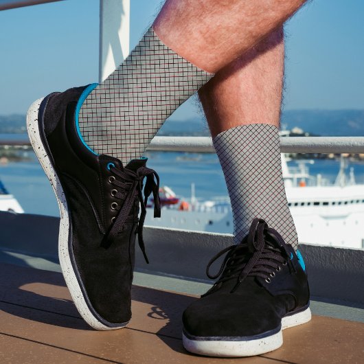 Abstraktes, grau-schwarzes Muster in gekreuzter Li Socken