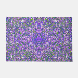 Abstraktes Kaleidoskop-Muster in grün und Lila Fußmatte