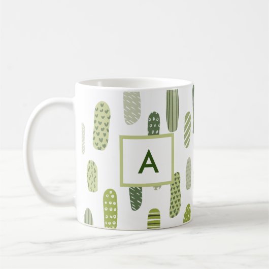 Abstraktes Monogramm aus grüner Pastete Kaffeetasse (Links)