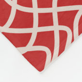 Abstraktes Muster in Rot und Creme Fleecedecke (Ecke)