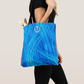 Abstraktes Muster-Monogramm mit wirbelndem blauem Tasche (Von Nahem)