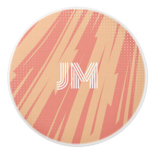 Abstraktes Retrodesign in Rosa und Orange Keramikknauf