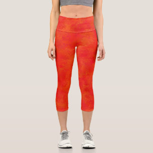 Abstraktes rotes Orangenmuster Capri Leggings