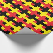 Abstraktes Rotes, schwarz und gelb Geschenkpapier (Ecke)