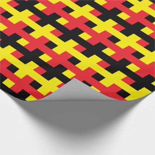 Abstraktes Rotes, schwarz und gelb Geschenkpapier (Ecke)