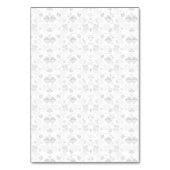 Abstraktes Wiederholmuster stilisierter Formen in  Tischnummer (Rückseite)