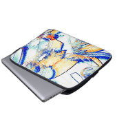 Abtropfte Tinte, Bild mit orangefarbenem und blaue Laptopschutzhülle (Vorne Knopf)