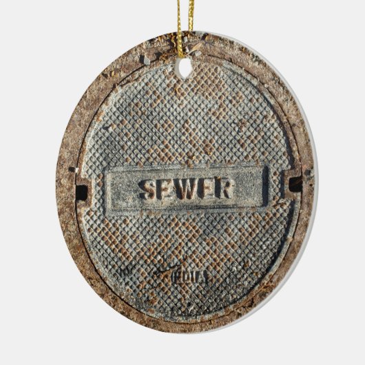 Abwasserkanal-Einsteigeloch-Abdeckung offiziell Keramikornament (Links)