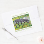 Achten Sie auf den Aufkleber für die Erde (Umschlag)