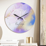 Acryl Wanduhren<br><div class="desc">Diese abstrakte lila Aquarellfarbe und das goldene Imitat bespritzen den Hintergrund mit Ihren individuellen Details.</div>