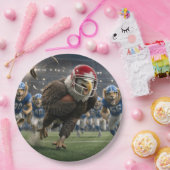 Adler läuft mit einem Fußball Pappteller (Party)