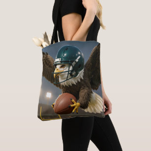 Adler mit einem Football in einem Sportstadion Tasche