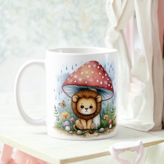 Adorable Baby Lion Cube unter einem Pilzschirm Kaffeetasse