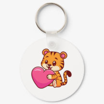 Adorable Baby Tiger umarmt ein Herz