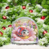 Adorable Ladybug sitzt auf rosa Blume Schneekugeln (Weihnachten)
