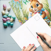 Adorable Ostersonnige Kaninchen im Korb mit Eiern Postkarte