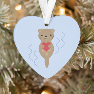 Adorable Otter umarmt ein Herz Ornament