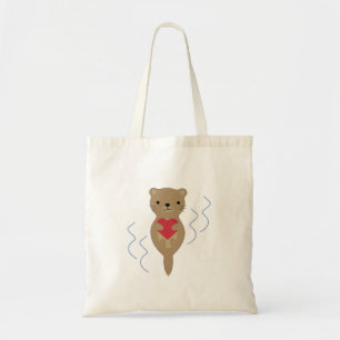 Adorable Otter umarmt ein Herz Tragetasche