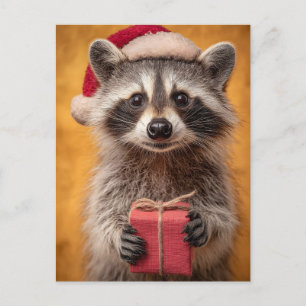 Adorable Raccoon in einer Weihnachtsmannmütze, die Feiertagspostkarte