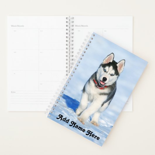 Adorable sibirische Husky Welpe im Schnee Planer (Anzeige)
