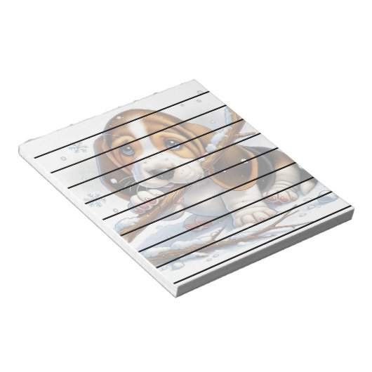 Adorable Welpe, die einen schneesicheren Stick häl Notizblock (angewinkelt)