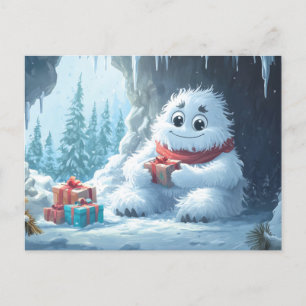 Adorable Yeti mit Weihnachtsgeschenken in einer Hö Feiertagspostkarte