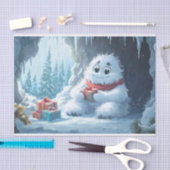 Adorable Yeti mit Weihnachtsgeschenken in einer Hö Seidenpapier (Handwerk)