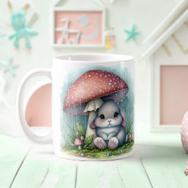 Adortable Baby Kaninchen unter Pilzschirm Kaffeetasse
