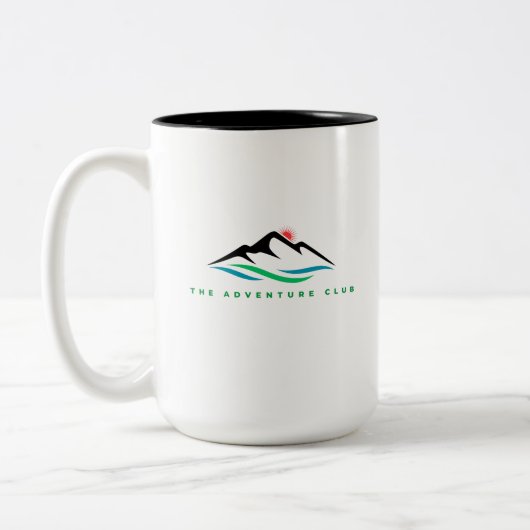 Adventure International Club Zweifarbige Tasse (Links)