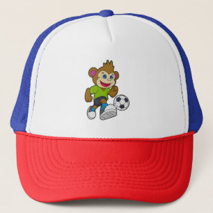 Affe als Fußballspieler mit Fußball Truckerkappe
