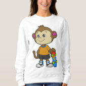 Affe als Skater mit Skateboard Sweatshirt (Vorderseite)